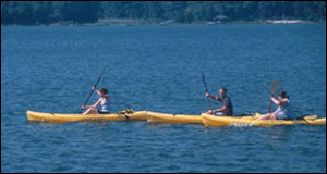 students enjoying the day on 3 kayaks