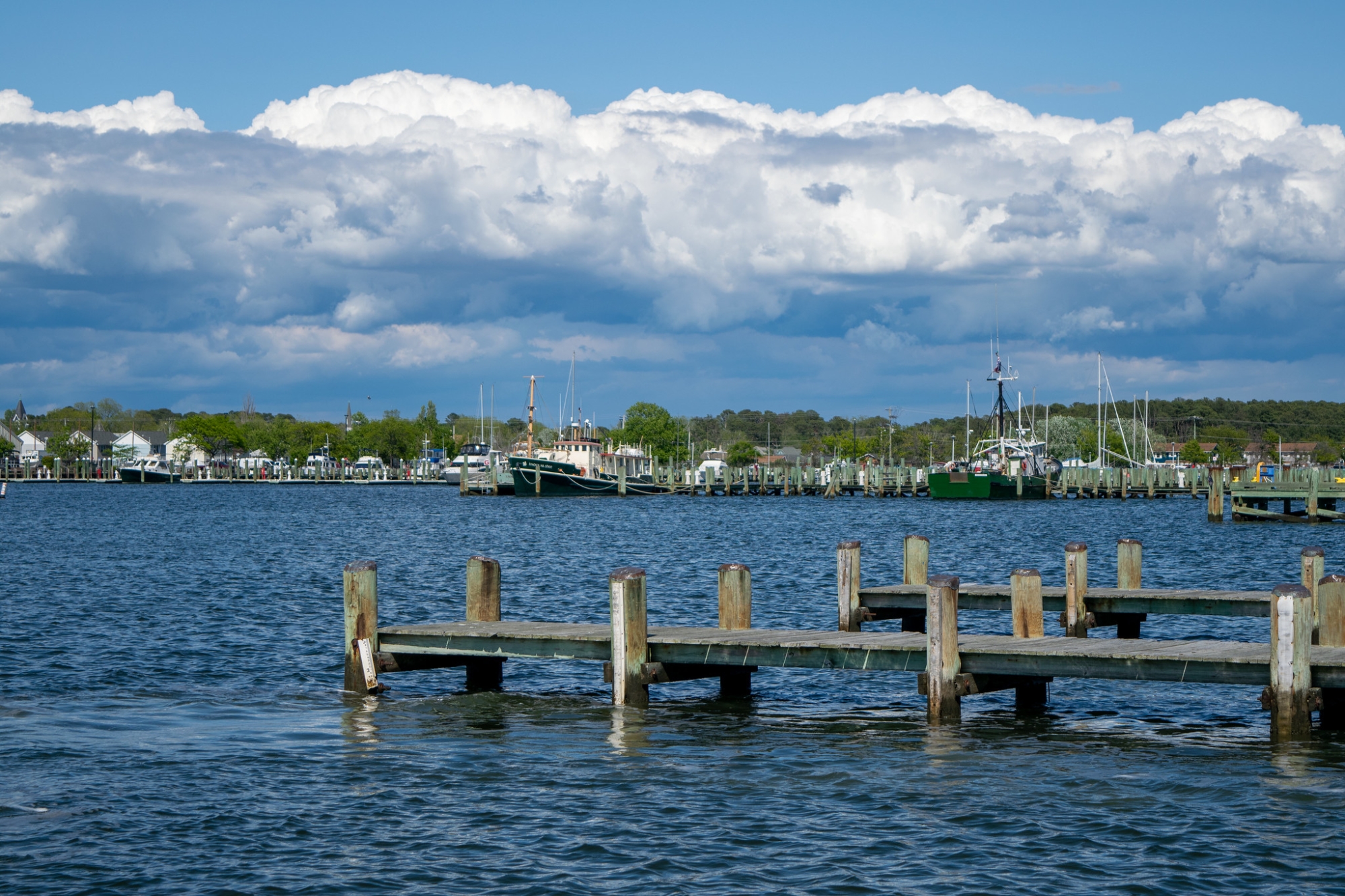 A marina with piers and docked boats